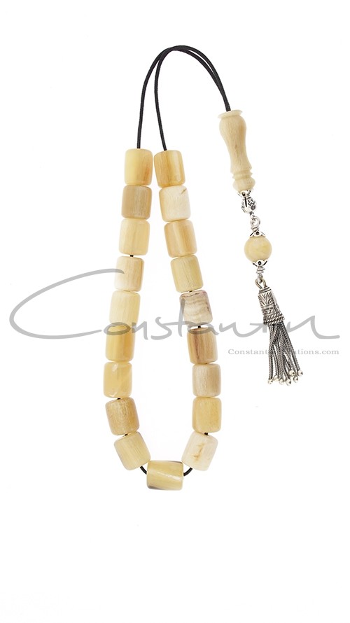 Selected natural horn, Greek komboloi with silver decoration.