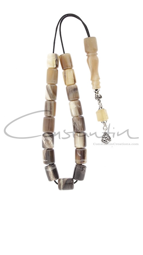 17 beads and nicely shaped head bead of natural horn. Silver decorated , Greek komboloi.