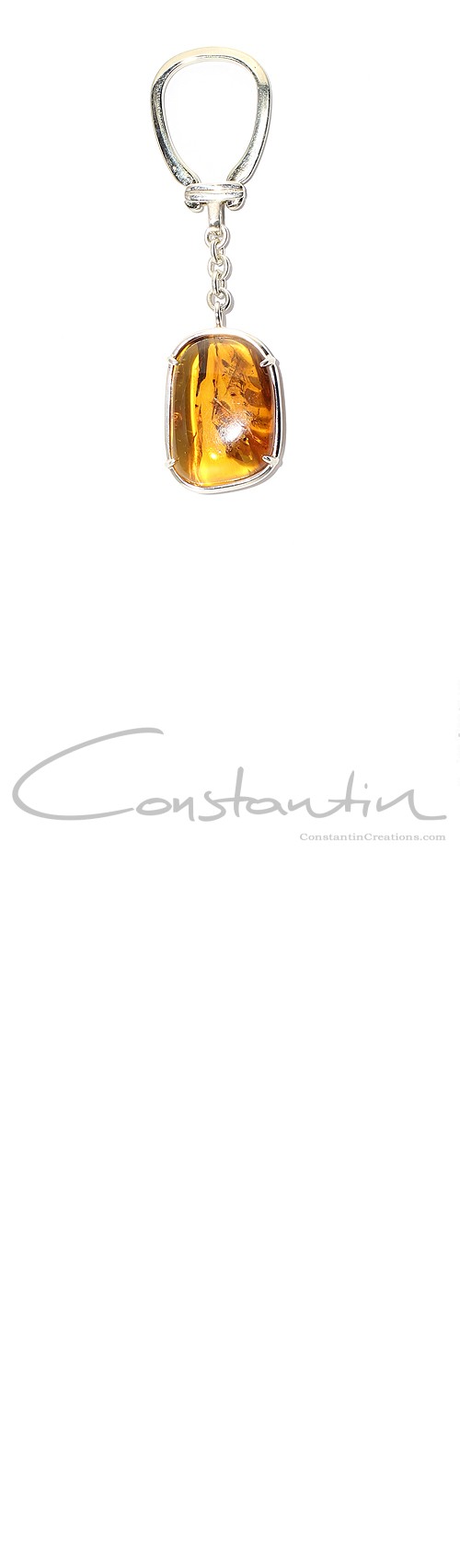 Unique, Hand Made Key holder made of natural Dominican Amber and sterling silver.