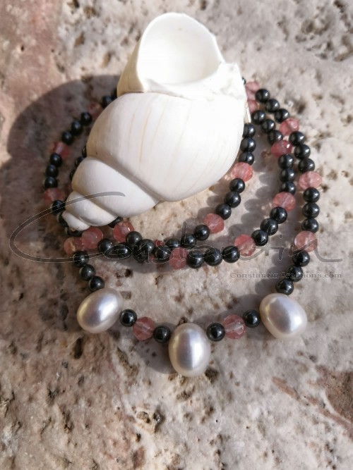Easy-going beaded necklace of cherry quartz and natural pearls.
