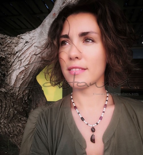 Multi color, handmade beaded necklace of natural gemstones and pearls.