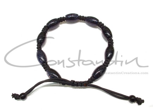 Dark blue goldstone knotted bracelet