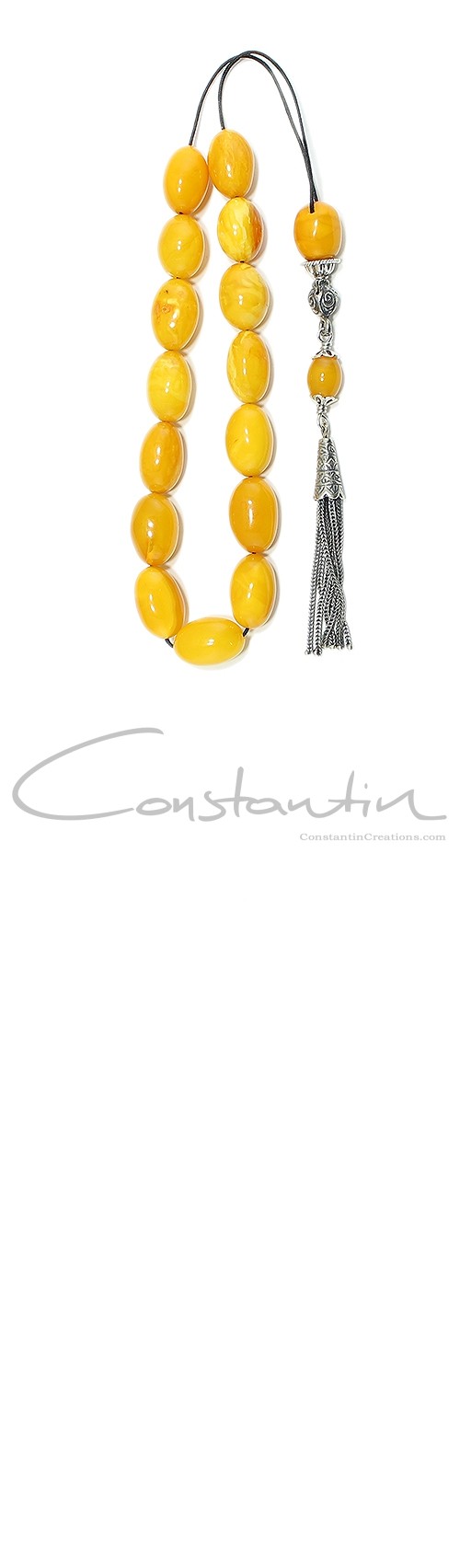 Hand crafted Greek komboloi, made of selected, dark yellow natural amber. 