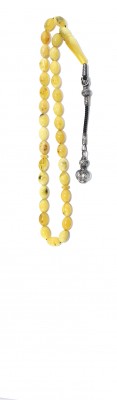 Yellow natural amber worry beads in traditional style.