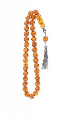 Handcrafted, carved amber worry beads set .