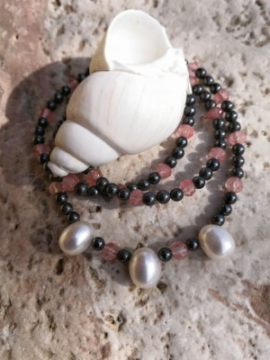 Easy-going beaded necklace of cherry quartz and natural pearls.