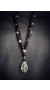 Tear drop shape, Rock crystal pendant, on handcrafted beaded necklace.