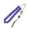  19 selected stone beads and additional bead on tassel.