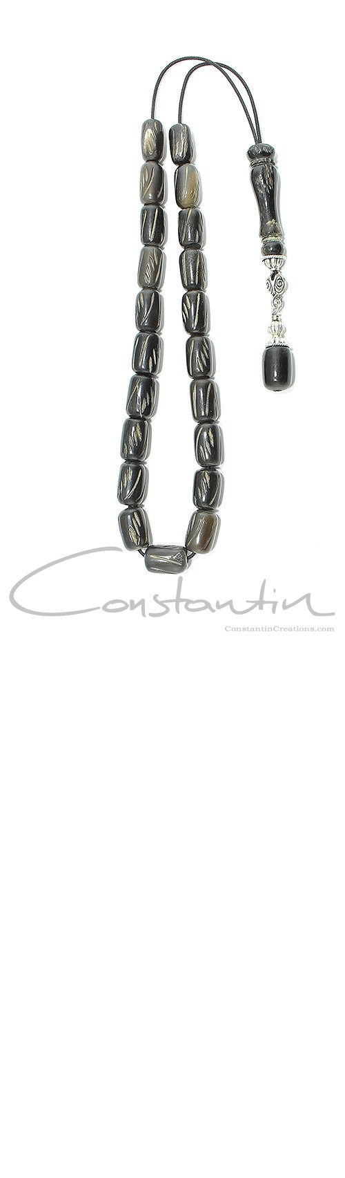 Elegant, Greek komboloi made of hand engraved horn and silver parts.