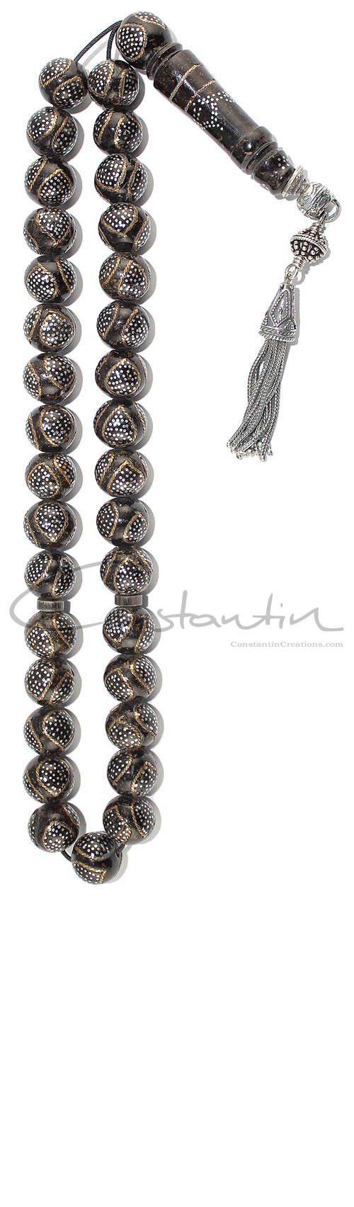 Natural Black Coral set, decorated by hand work with silver and copper inlays.