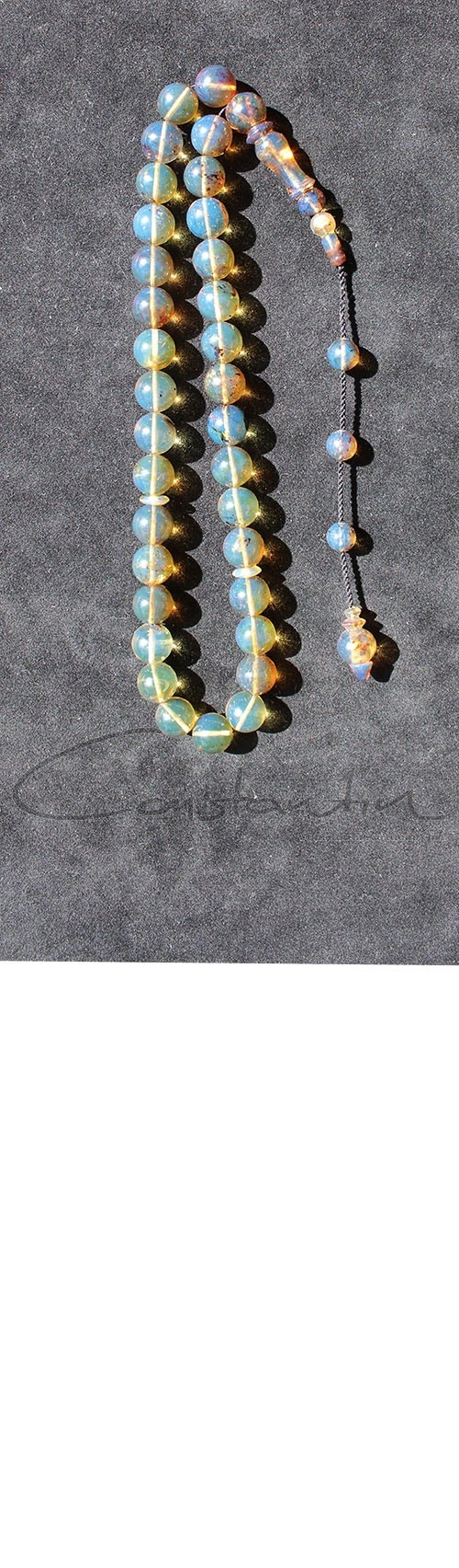 Rare combination of Blue, Green and Honey color variations made of Top quality , semi transparent, Dominican Blue Amber. 