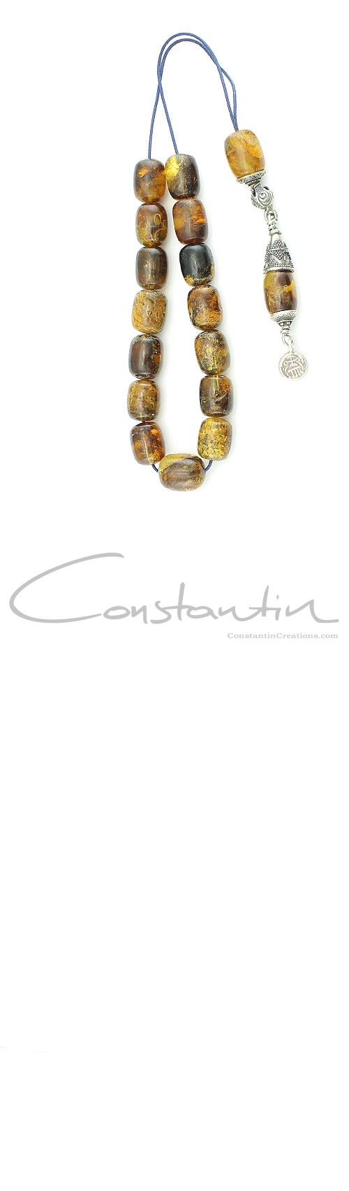 Pocket size Greek komboloi of selected Dominican amber with natural inclusions.