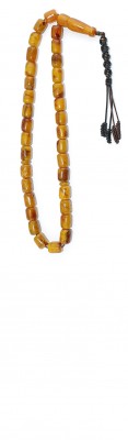 Worry beads set, made of dark Yellow natural amber, with darker and lighter shades of Brown.