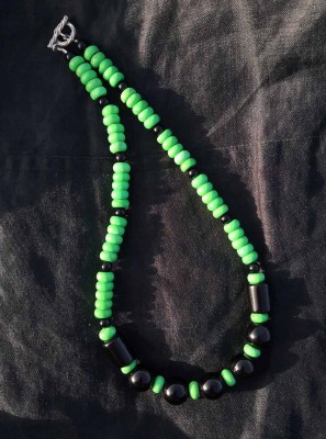 Casual necklace made of of Lime Green Turquoise,  black Onyx and antique finished silver parts. 