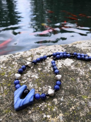 Stylish, Blue Sodalite, handcrafted necklace, decorated with silver and black onyx beads.