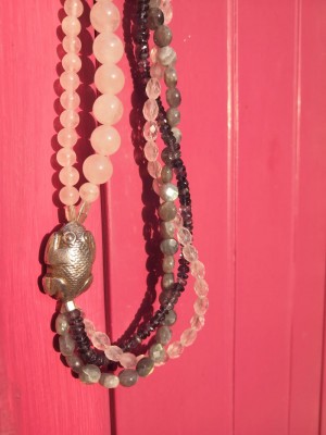 Multi strand necklace of Iolite, Labradorite and Rose quartz semi precious stones.