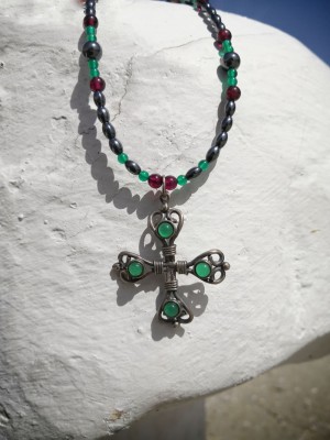 Vintage silver cross on multi color, handcrafted beaded necklace.