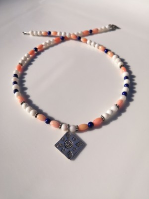 Multicolor, hand crafted necklace of white Quartzite, pink Coral and Lapis Lazuli beads.