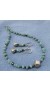 Handmade necklace & matching earrings made of natural faceted Aquamarine and hematite stone beads, with silver parts. 