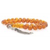 Traditional, vintage look, hand made silver tassel decorated with amber bead.