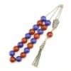 Round, calibrated cut and fine polishing. 19 selected stone beads and additional bead on tassel.