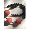 Three large and impressive , natural sponge coral beads are dominating this easy wearing design.