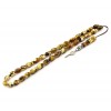 A complete set with 33 mosaic amber beads in symmetrical oval cut, head piece and dividing beads.