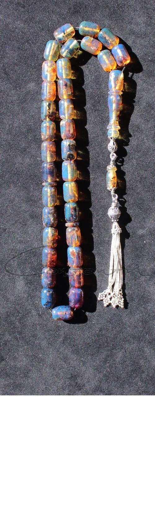 Rare combination of Blue and Honey color variations made of Top quality ,semi transparent, Dominican Blue Amber. 