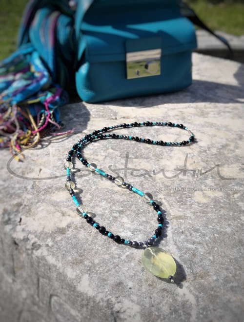 Multicolor, hand crafted long necklace and matching earrings.