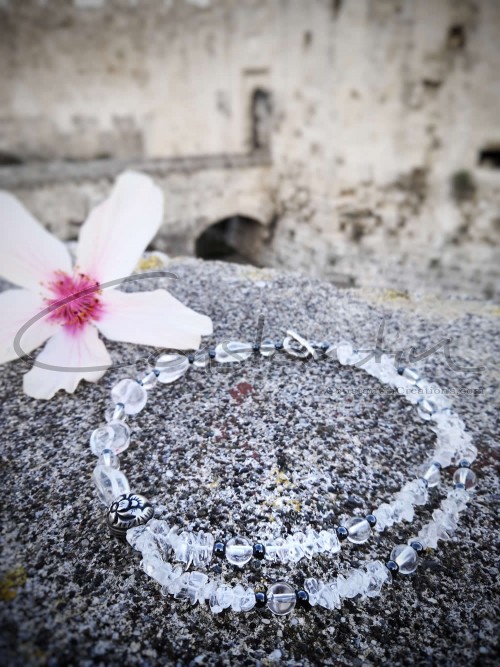 Mineral Rock Crystal, handcrafted necklace, decorated with Hematite beads and silver parts.