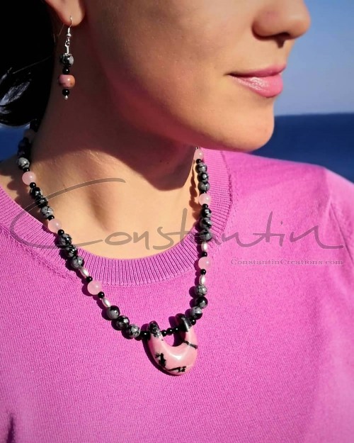 Colorful combination of gemstones in a unique necklace with matching earrings.