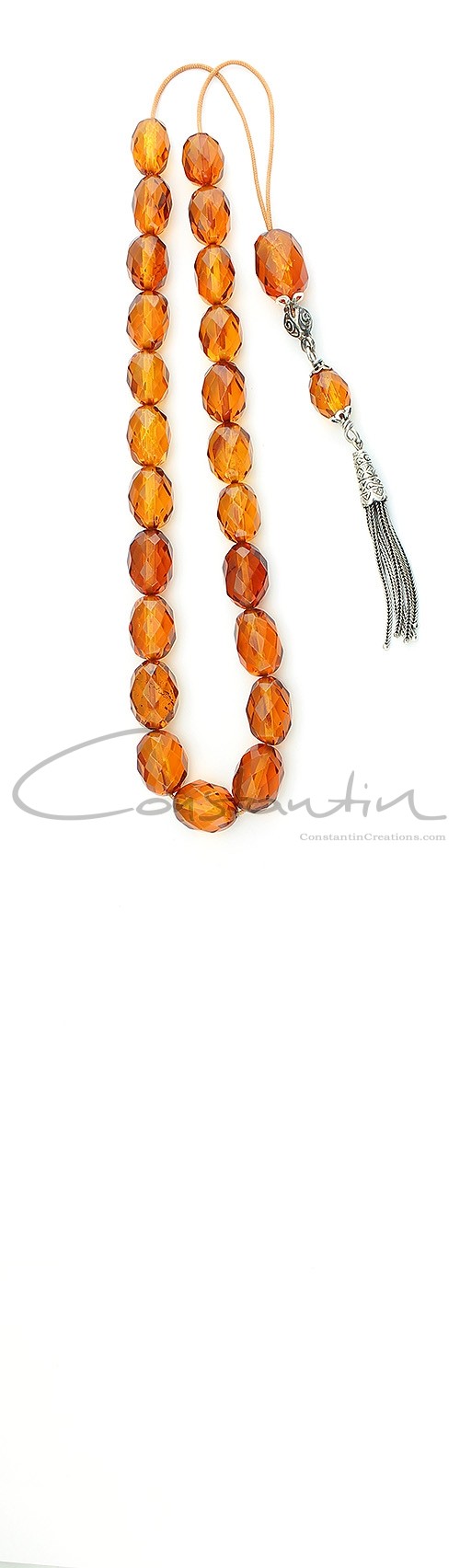 Faceted , light honey natural amber Greek komboloi .