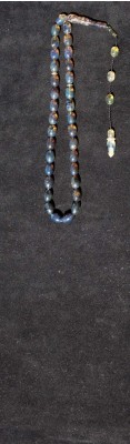 Dark selection of half transparent, Dominican Blue Amber in a traditionally hand crafted worry beads set.