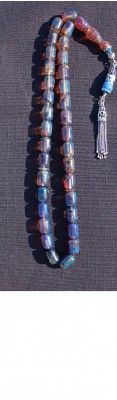 Extraordinary, hand crafted worry beads set made of   Dark Blue, Natural Dominican amber.