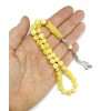 A very good selection of light yellow amber beads with unique lighter and darker shades.