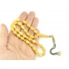 A very good selection of light yellow amber beads with unique lighter and darker shades.