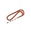 The amber beads are initially shaped and nicely curved with classic pattern details.