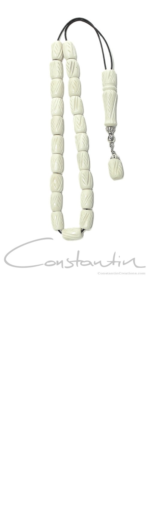 Komboloi of camel bone beads with artistic engraved details.