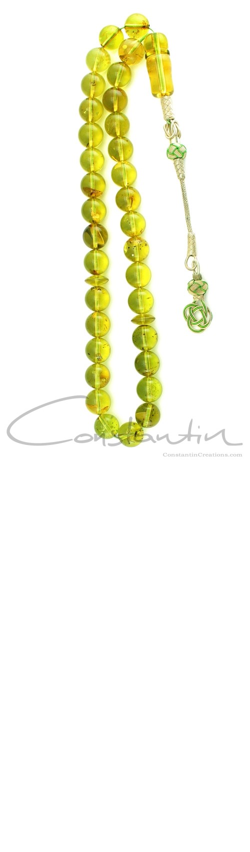 Small fossilized insects in worry beads set made of natural, green Colombian amber. 