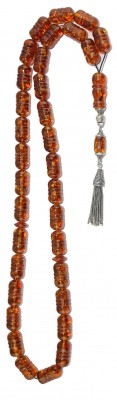 Classic style, Long natural amber worry beads with engraved details.