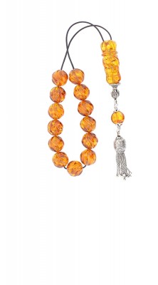 Exclusive mini Greek komboloi, made of engraved natural amber.