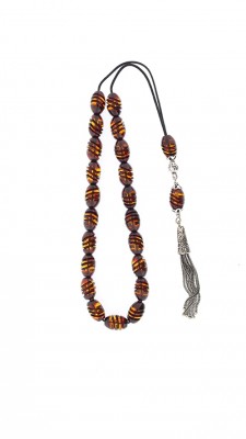 Greek komboloi of engraved amber beads and silver parts.