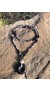 Long, free style necklace, with disk shaped Black Onyx center bead. 