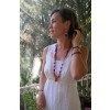 A long necklace, matching bracelet & earrings made of natural materials and an inspired color combination.