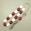 Pocket size with 15 selected beads and head bead, hand crafted antique finished sterling silver 925° parts and tassel.